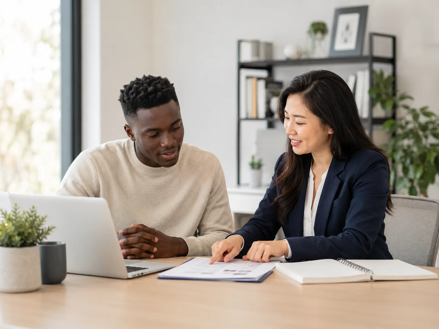 Student speaking with an education adviser